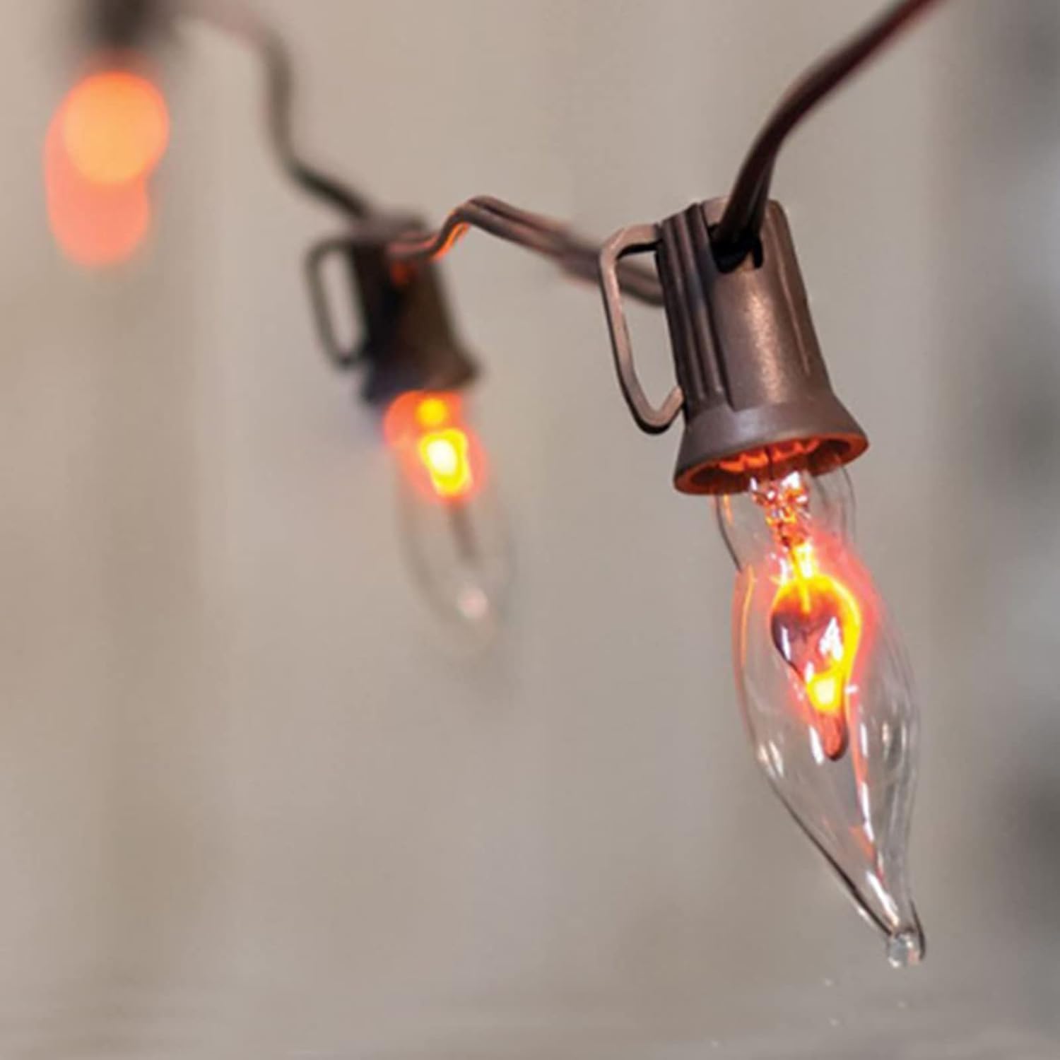Romasaty C18 Halloween Flicker Flame String Lights, 10FT, Orange Glow, 10 Light, Black Wire
