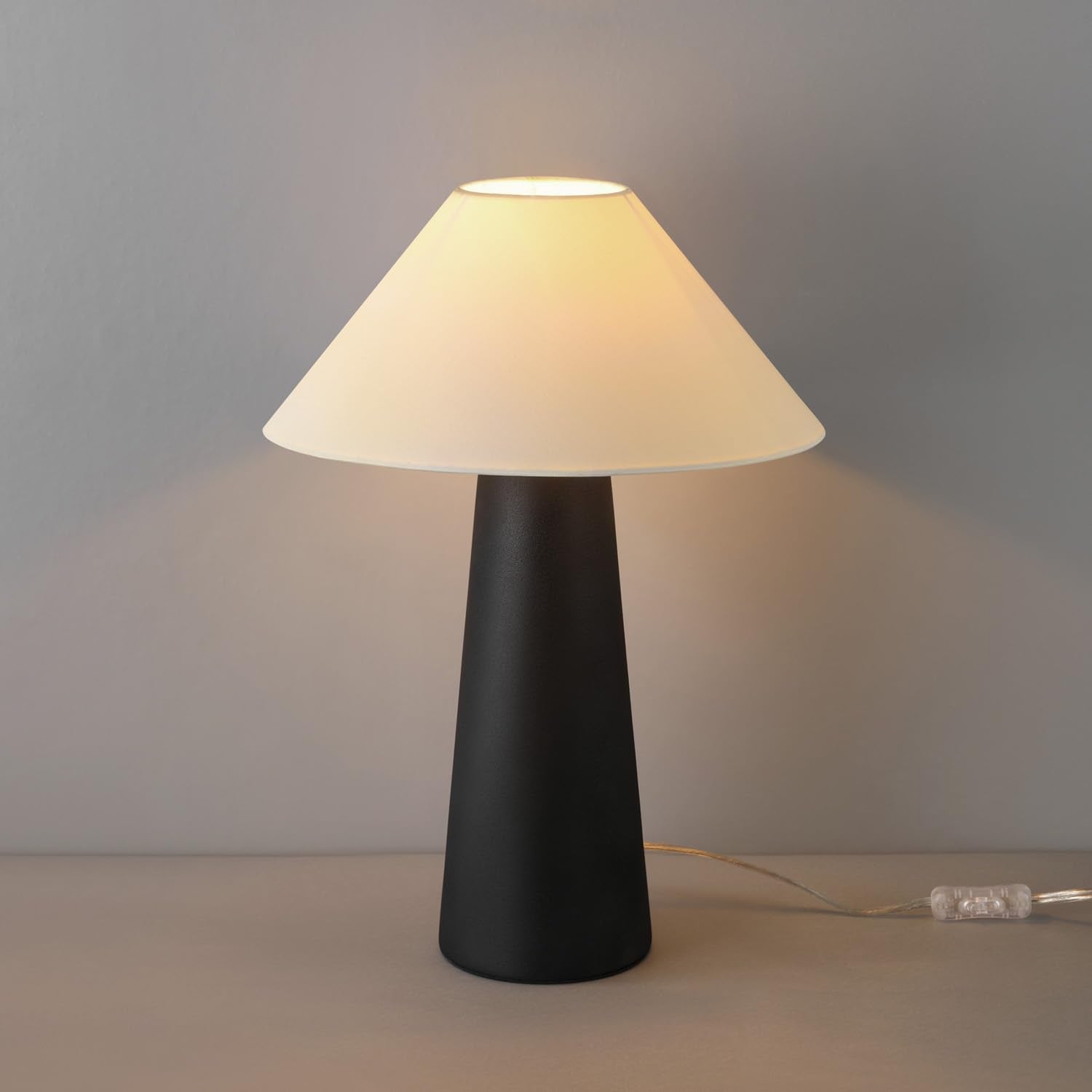 Novogratz X Globe 18'' Ceramic Table Lamp, Matte Cream, Off-White Tapered Fabric Shade, In-Line Rocker Switch, 5 Ft. Clear Cord,