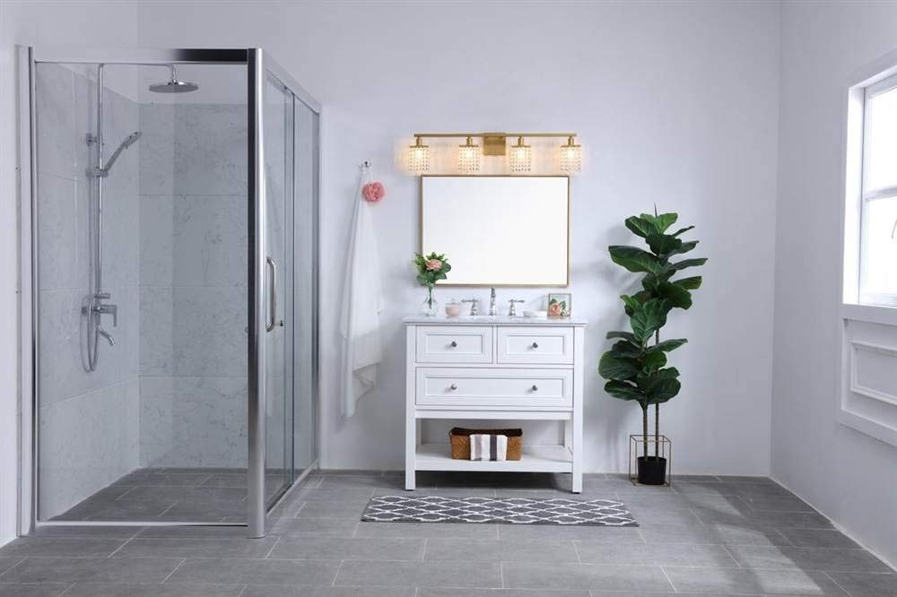 Living District Phineas 4-Light Metal Wall Sconce in Brass and Clear Crystals