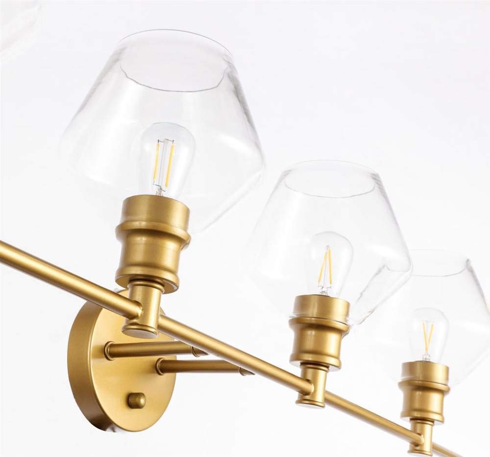 Living District Gene Industrial Mid-Century Modern 4 Light Entryway and Bathroom Wall Sconce in Brass and Clear Glass
