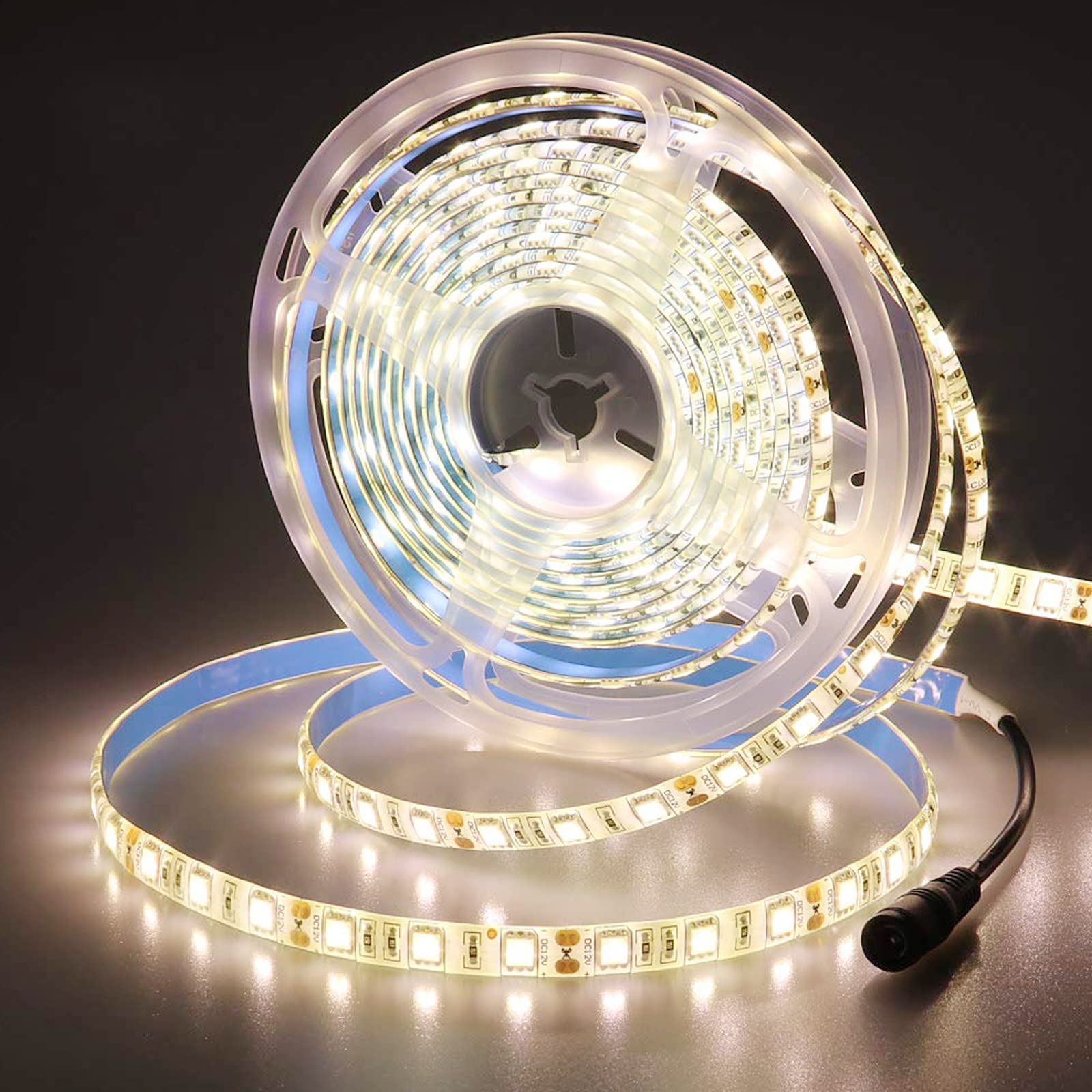 JOYLIT 12V Warm White LED Band Lights 3000-3500K 16.4ft/5M IP65 Waterproof 5050 SMD 300LEDs Cuttable Flexible Self Adhesive Tape Light for Bedroom  Kitchen  Cabinets  Shelf (LED Band Only)