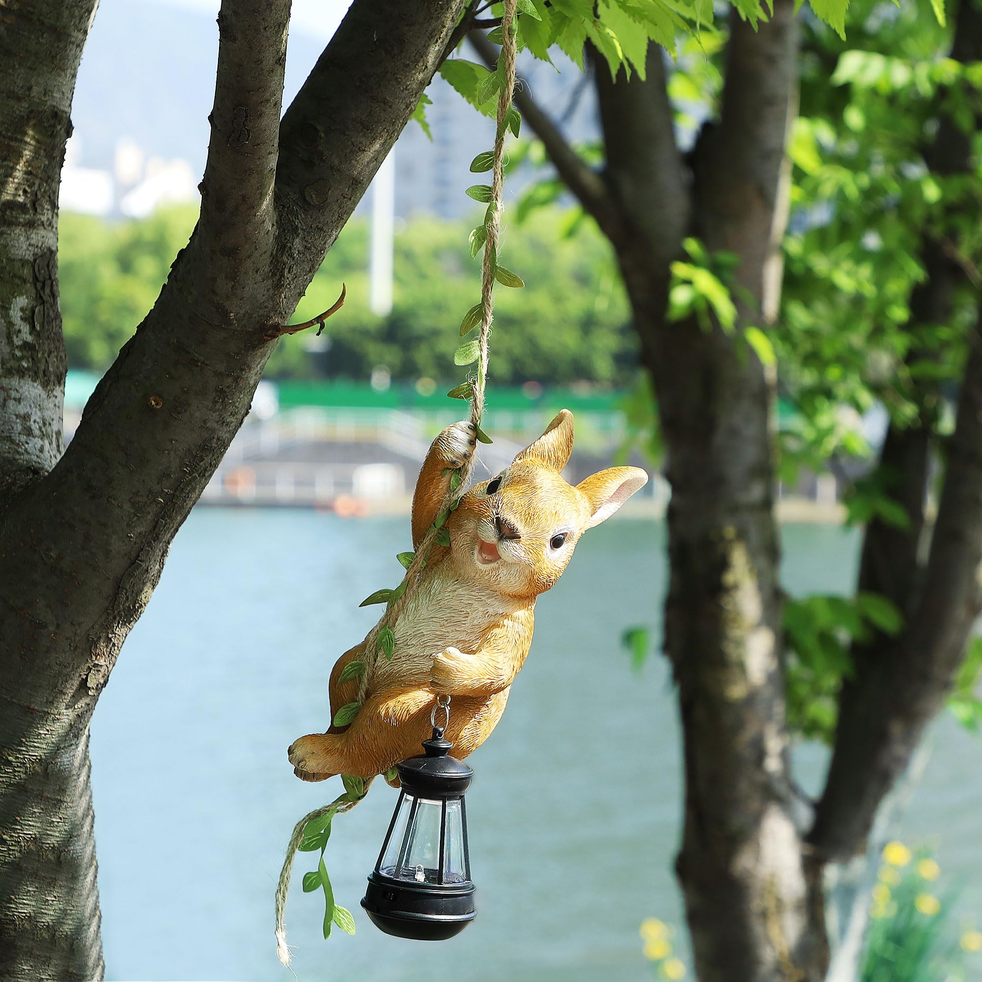 Joliyoou Solar Light Outdoor Statue, Resin Rabbit Climbing on Vine with LED Lantern, 6.9in H, 23.6in L, Waterproof Hanging Figurine