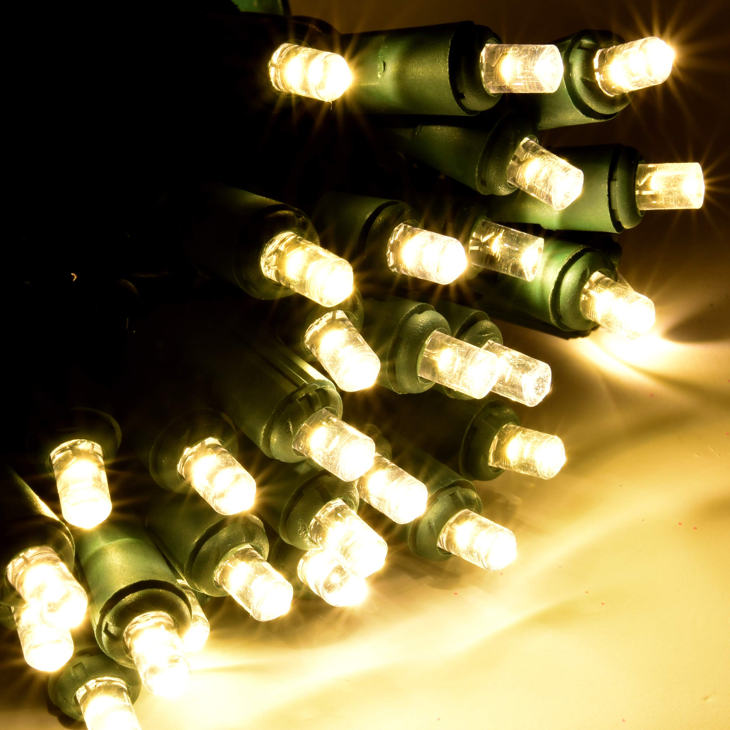 Holiday Essence 60 LED Mini Warm White Christmas Lights for Indoor and Outdoor Use Energy Efficient LED Bulbs with Green Wire