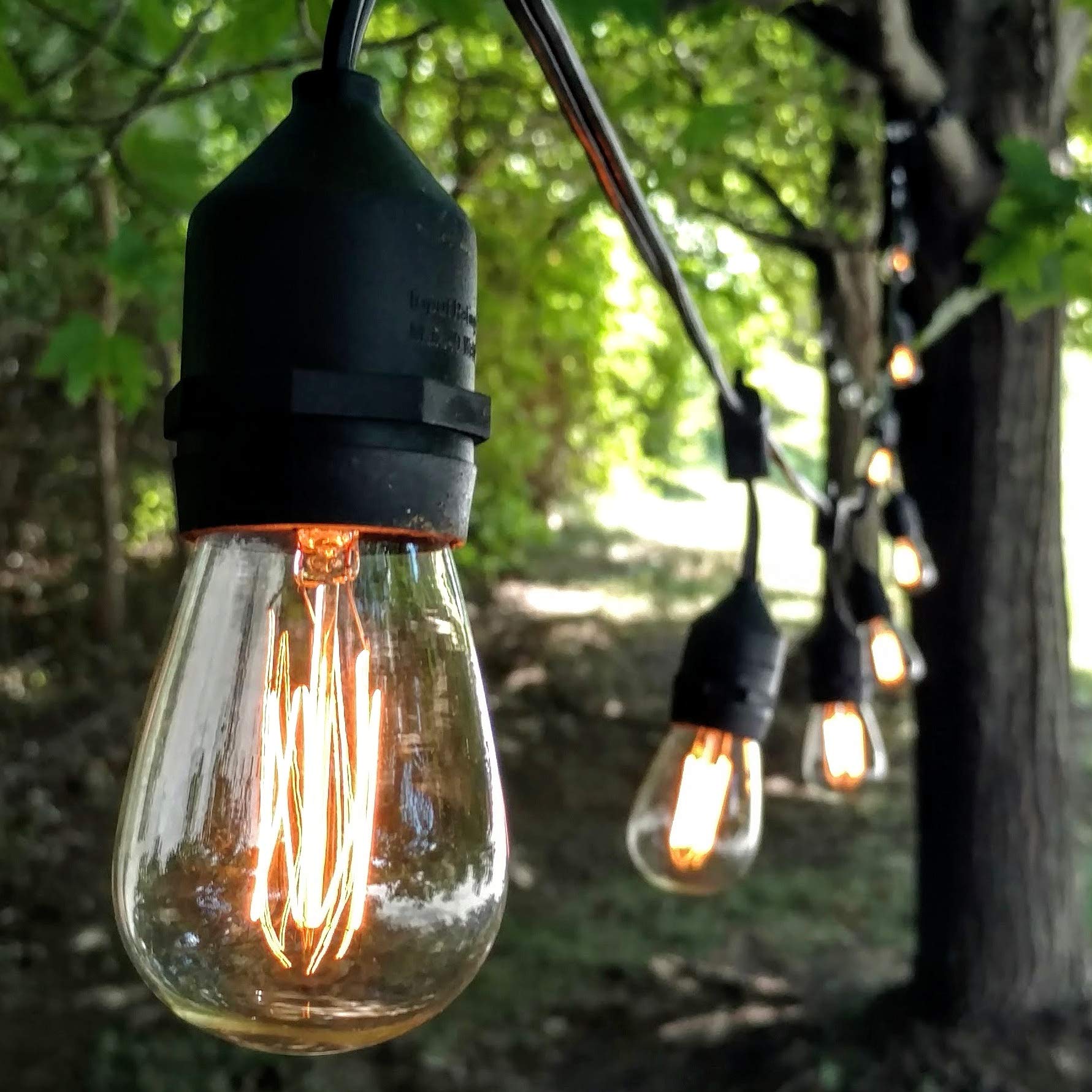 Hometown Evolution  Inc. E26 Outdoor Commercial String Lights With Suspended Socket For Weatherproof Heavy Duty Vintage Outside Lighting (S14 Lantern Edison 11 Watt Bulbs  24 Foot 12 Socket)