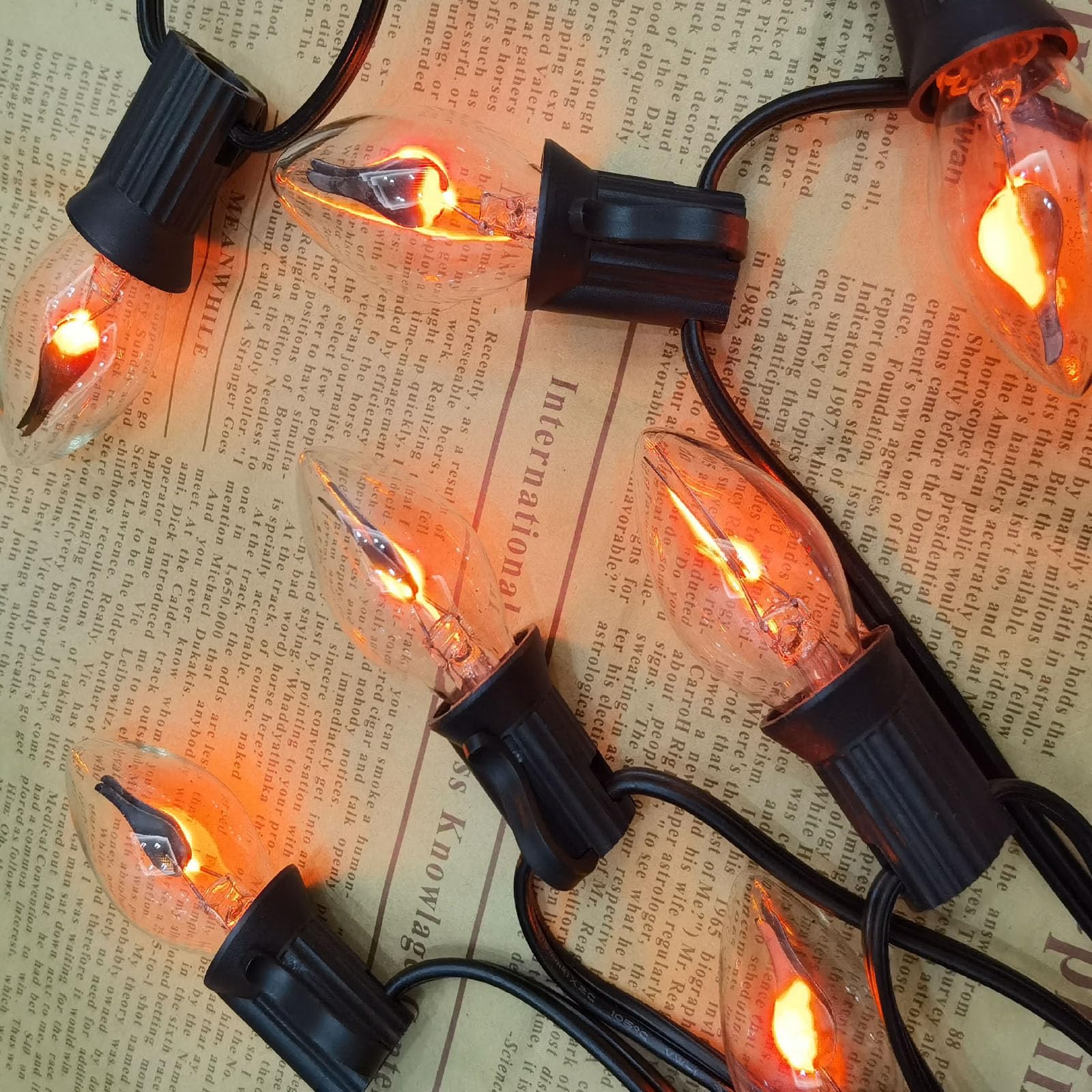 GOOTHY C7 String Lights, 25Ft Outdoor Christmas Decorations, Clear Flicker Flame Glass Bulbs, Black