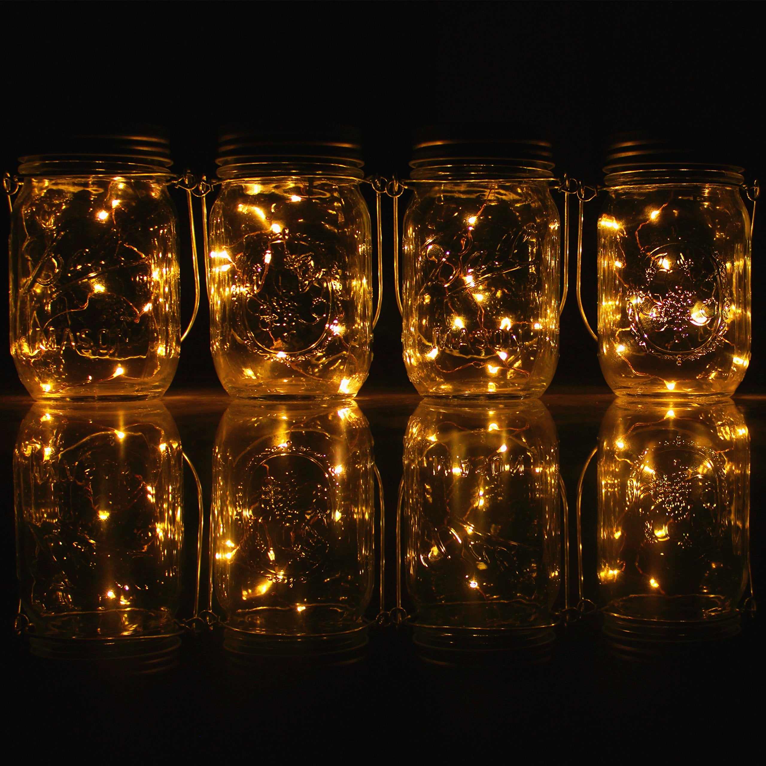 CHBJDAN Solar-Powered Mason Jar Lights, 4 Pack with Handles, Warm White, Model 43349-4067, Outdoor Hanging Lanterns