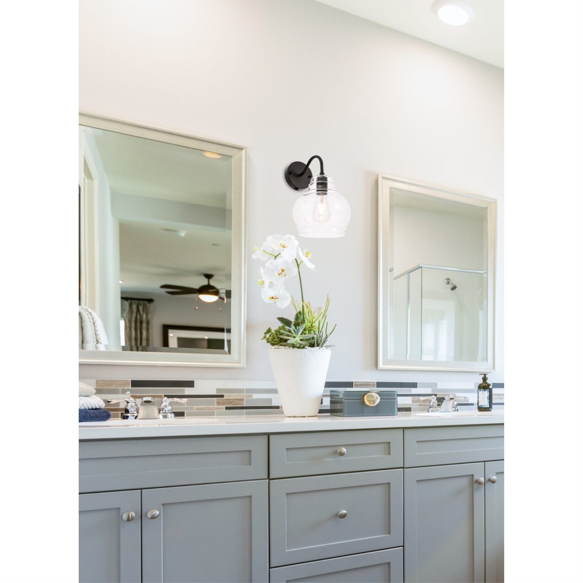 Living District 1-Light Metal & Glass Wall Sconce, Black/Clear, Model LD6192BK