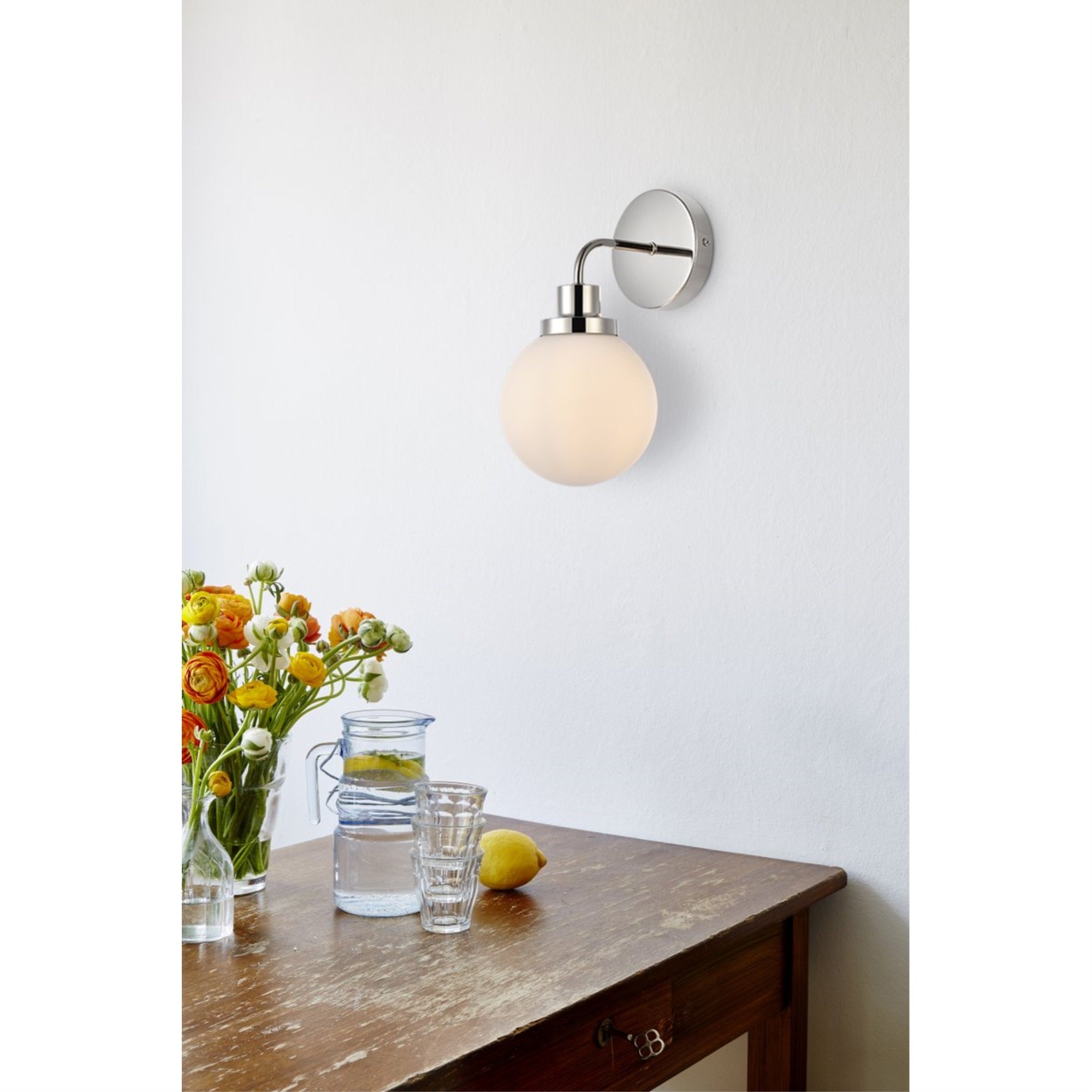 Hanson 1 light bath sconce in polished nickel with frosted shade