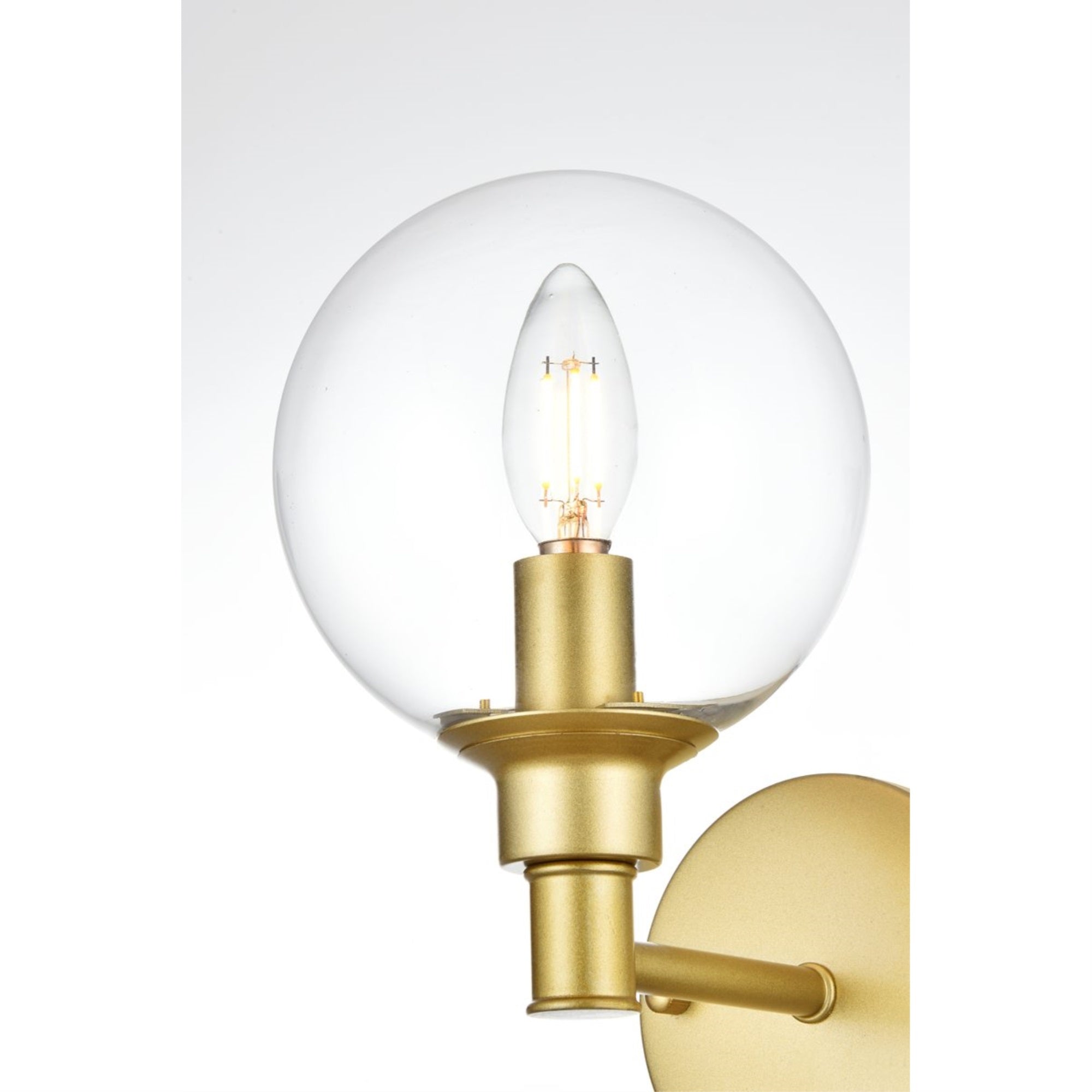 Living District Jaelynn 1-Light Bath Sconce, Iron & Glass, Brass/Clear, Model LD7318W6BRA