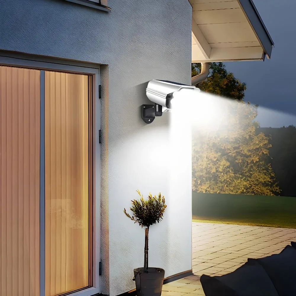 3 Modes Multi-angle Lighting Remote Control Solar Powered Simulation Monitoring Induction Wall Lamp with Red Light Warning