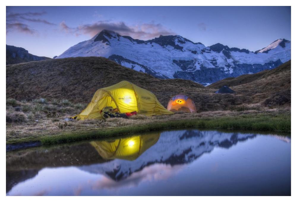 Campers read in tents lit by flashlight, Cascade Saddle, Mount Aspiring National Park, New Zealand-Paper Art-50''x34''