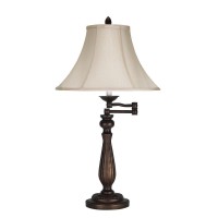 Add a classic touch to your home or office with this elegant antique rust table lamp It features a durable metal construction and a candelabra style swing arm for the optimal control of light This lamp ships complete with matching shade and finial