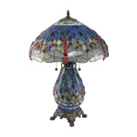 This unique Dragonfly Table Lamp has been handcrafted using methods first developed by Louis Comfort Tiffany The shade contains pieces of stained glass each handcut and wrapped in fine copper foil in rich tones of blue Red dragonflies accent the shade Thi