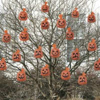 Clean up leaves while also creating a spooktacular front yard with these Mini Hanging Pumpkin Leaf Bag Halloween Decorations Featuring an assortment of fun jackolantern faces these extrasmall pumpkin leaf bags will make it easy to decorate your lawn for t