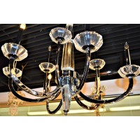 Sleek and elegant this stunning 8light chandelier only uses the best quality material and workmanship ensuring a beautiful heirloom quality piece Featuring beautiful curved arms in radiant Chrome Finish and crystal Beaches made of finely cut premium grade