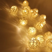 A twist of rattan shaped into a ball makes a beautiful decoration Hang these versatile balls indoor and outdoor as a moodbooster 20 balls evenly spread through 10ft long string with 4 inches intervals The string is powered by a compact power pack 3 pieces