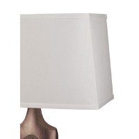 This table lamp give your space more than just lighting It is also great for complementing your decor Or giving a pop of funky style to an understated space Showcasing an artistic stand resting on a base Glossy Brown finish white Rectangular shaped shade 