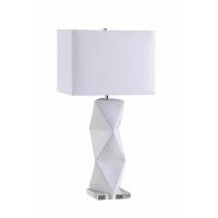 Versatile and functional table lamp with cubical shade is a great addition to your home It is made of ceramic which ensures strength and durability It flaunts a white finish which looks classy and suits most color schemes