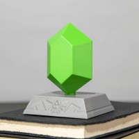 Light up your room with an iconic symbol from the hugely popular Legend of Zelda The Legend of Zelda Green Rupee 3D Light takes its distinctive 3D design from the green colored rupees found throughout the Legend of Zelda series of games Measuring approxim