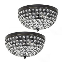 Bejewel your home with this gorgeous two 2 light Elipse crystal ceiling flush mount It features a beautiful Restoration Bronze finish and crystal tiled shade This fabulously chic design will be the envy of all your friends We believe that lighting is like