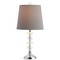 Add gracious style to the living room with this contemporary table lamp Its delicately crafted clear spheres and matching posh finial and base are perfectly paired with its complimentary grey shade An investment in modern luxury designers use in pairs