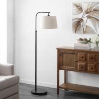 Ideal beside your favorite reading chair or living room recliner the Winley Floor Lamp perfectly softens industrialchic style An oilrubbed bronze finish and calm grey barrel shade give it just enough transitional flair to beautifully suit any dcor