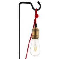 Beckon chic industrial style into your home or apartment with the Signal Table Lamp Positioned on a sleek matte black metal base Signal comes with an antique brass light socket suspended from a red cord for an antique vintage look This rustic modern farmh