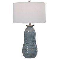 This ceramic Table Lamp has a Tapering Ribbed Surface that39s Finished in a Light Blue crackled glaze44 Accented with Brushed Nickel Details46 A Hardback Drum Shade in White Linen compliments this Piece46 Due to the Nature of Fired glazes on ceramic Lamps