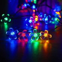 Mankinlu Solar String Lights Outdoor,Waterproof Solar Powered Cherry Blossom Lights String,39Ft 100Led Christmas Twinkle Lights Solar Fairy Lights For Garden Landscap Lawn Patio Xmas Tree Multicolor