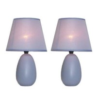 A lovely inexpensive and practical table lamp set to meet your basic fashion lighting needs These mini lamps feature an oval shaped ceramic base and matching fabric shades Perfect for living room bedroom office kids room or college dorm