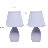 A lovely inexpensive and practical table lamp set to meet your basic fashion lighting needs These mini lamps feature an oval shaped ceramic base and matching fabric shades Perfect for living room bedroom office kids room or college dorm