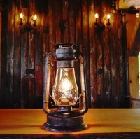 Electric Lantern Table Lamp For Bedrooms To Give You The Perfect Farmhouse Look Large 15 Inches Tall With Large Hurricane Glass And In Line Cord Dimmer. Rustic Rust Patina Hand Finish.