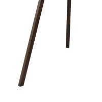 This floor lamp with its vintage spotlight inspired design will not only illuminate your space but will also enhance your home dcor style This lamp comes with antique oak brown finish wooden tripod base while has a silver chrome finished cylindrical metal