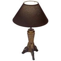 The famed god of the afterlife keeps watch in this fine Egyptian revival sculpt fashioned into a dramatic and quite mesmerizing table lamp A welcome escape from harsh ceiling lights our Anubis lamp adds a warm glow beneath an ebony fabric shade Cast in qu