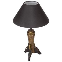 The famed god of the afterlife keeps watch in this fine Egyptian revival sculpt fashioned into a dramatic and quite mesmerizing table lamp A welcome escape from harsh ceiling lights our Anubis lamp adds a warm glow beneath an ebony fabric shade Cast in qu