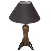 The famed god of the afterlife keeps watch in this fine Egyptian revival sculpt fashioned into a dramatic and quite mesmerizing table lamp A welcome escape from harsh ceiling lights our Anubis lamp adds a warm glow beneath an ebony fabric shade Cast in qu