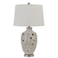 Description150W Leland creamic table lamp with leaf design and taper drum hardback fabric shade