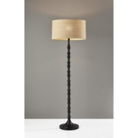 Add a layer of rich natural texture to your home with this Floor Lamp A turned black base is paired with a natural woven paper shade that reveals a stunning texture when lit The floor lamp fits perfectly into electric bohemian inspired styles or adds an i