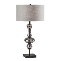 A contemporary take on a traditional silhouette this Table Lamp is an eyecatching addition to your living or bedroom space A black finish is paired with turned mercury glass to create a stunning modern look With a taller profile at a 287534 height this la