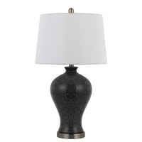 Complete the look of your sitting area with the inclusion of this ceramic made table lamp available in set of 2 Urn shaped silhouette and tapered drum shade completes the look and makes it an ideal piece of addition