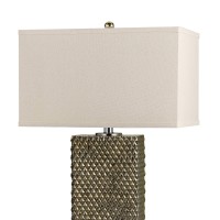 Accessorize your room with the inclusion of this stunning linen fabric square shade Table Lamp It requires a 150Watt bulb for an ample amount of light in the 3 Way intensity control switch that provides warm ambient lighting to the area The studded diamon