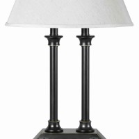 Emblaze your decor setting by bringing home this contemporary style Desk Lamp which comes with white color linen fabric Incorporated with power outlets and USB docks it is accented in the hue of black