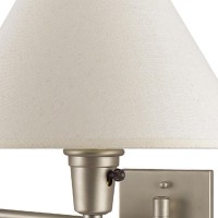 Emblaze your living space by incorporating this coveted contemporary style Wall Lamp which comes with a tapered drum shade and swing arm Incorporated with mounting hardware and constructed from metal frame the shade is wrapped in off white fabric