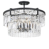 Light up your home with the rays of hope and happiness by bringing in this eye catching semi flush mount that doubles as a drop pendant fixture It features a round metal frame and showcases crystal like glass accents using 5 bulbs of 60 watt each It is pr