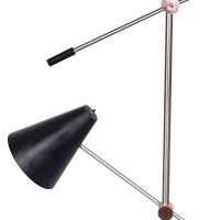 Emblaze your bedroom by bringing in this transitional style Floor Lamp which comes with dual lighting on tubular frame Constructed from metal frame and supported on round stable base it is accented with black finish