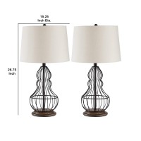 Add a stylish look to home decor by lighting up this amazing table lamp available in a set of 2 It features a metal body in a ground shape incorporating a 3 way switch for control and a tapered fabric shade that uses an A type bulb of 150 watt or 25 watt 