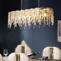 Product DescriptionFrom a kitchen island to a dining table this dining room linear gold chandelier floats with modern eleganceSpecificationsMount Type hanging chandelierMaterial and Color Glass shade Thickened Golden iron frameWattage 40WVoltage 120VPacka