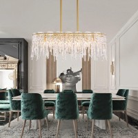 Product DescriptionFrom a kitchen island to a dining table this dining room linear gold chandelier floats with modern eleganceSpecificationsMount Type hanging chandelierMaterial and Color Glass shade Thickened Golden iron frameWattage 40WVoltage 120VPacka