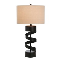 Depicting a very rare look this table lamp is here to accentuate the look of your entire interior setting Constructed from metal it showcases spiral design body with round block base which reinforces sturdy construction to the entire piece Fabric drum sha