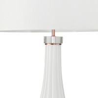 Designed to illuminate your bedroom or office with warm light this white shade Table Lamp will surely make a stylish addition Loaded with multiple features requires a 100Watt power capacity bulb for an enhanced personalized experience while the glass ribb